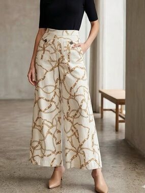 Anthropologie Cream Wide-Leg Pants with Gold Chain Print